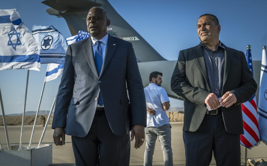 U.S. Defense Secretary Lloyd Austin and Maj. Gen. Eyal Zamir, director general of the Israeli Ministry of Defense, address reporters at Nevatim Air Base, Israel, on Oct. 13, 2023. 
