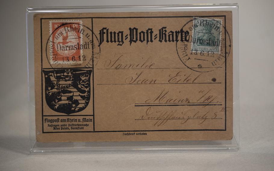 A postcard from Rhein-Main Airport, the predecessor of today's Frankfurt Airport, is part of the collection at the Zeppelin Museum in Neu-Isenberg, Germany. The Zeppelins transported mail as well as passengers. In the peak delivery year of 1936, the Graf Zeppelin and the Hindenburg combined took 20,400 pounds of mail to South America and 18,300 pounds to North America.