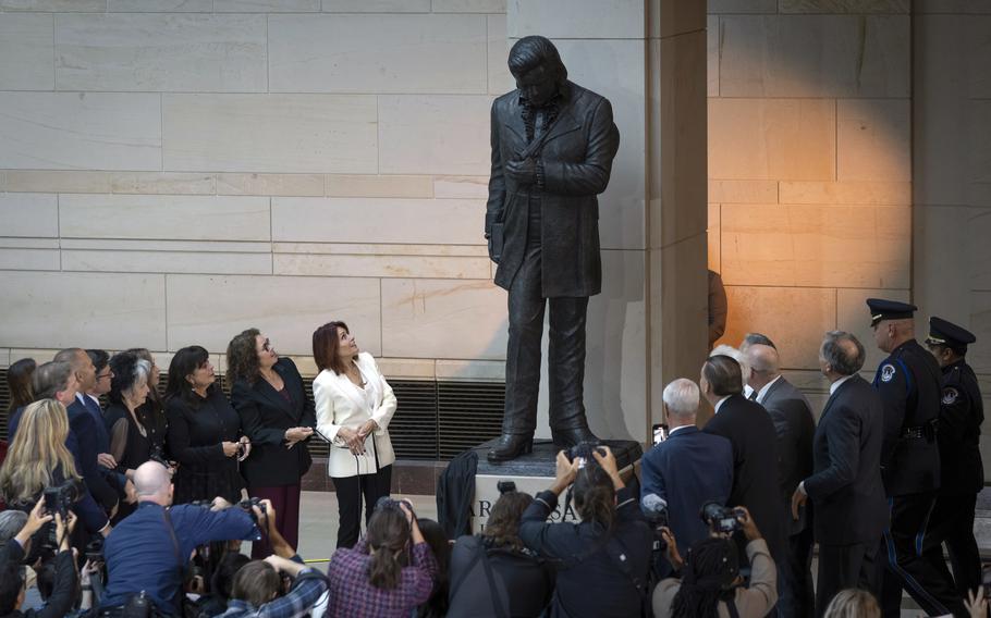 A bronze statue of singer Johnny Cash is unveiled at the Capitol