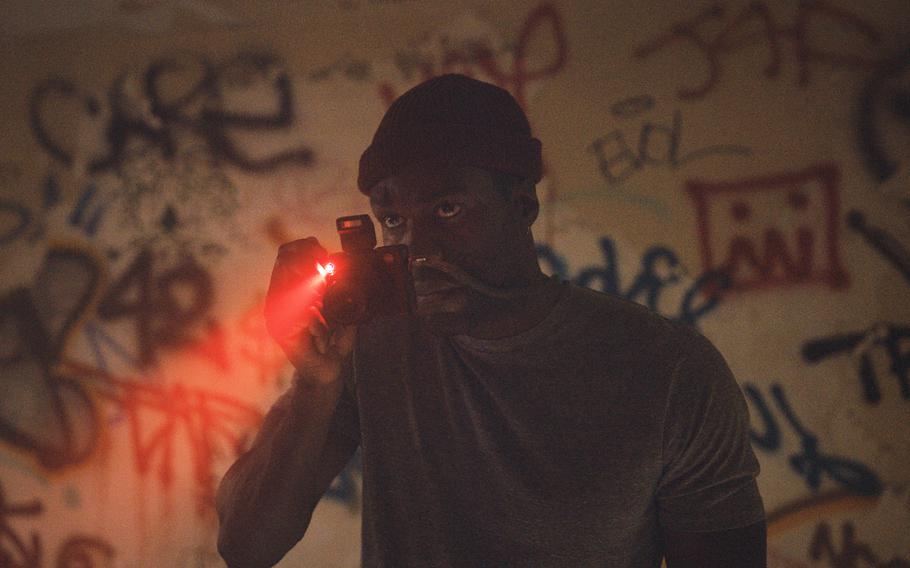 This image released by Universal Pictures shows Yahya Abdul-Mateen II in a scene from "Candyman," directed by Nia DaCosta. 