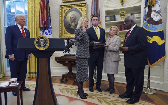 Pam Bondi is sworn in as Attorney General by Supreme Court Associate Justice Clarence Thomas, right, as President Donald Trump, partner John Wakefield and mother Patsy Bondi, look on, in the Oval Office of the White House, Wednesday, Feb. 5, 2025, in Washington. (AP Photo/Evan Vucci)