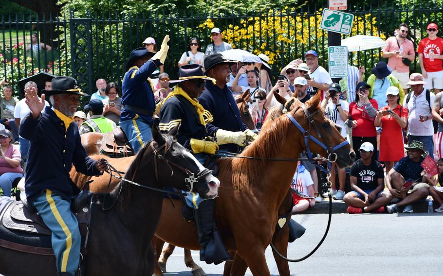 Men dressed in Union calvary uniforms ride horses in Washington, D.C.’s Independence Day parade on July 4, 2024.