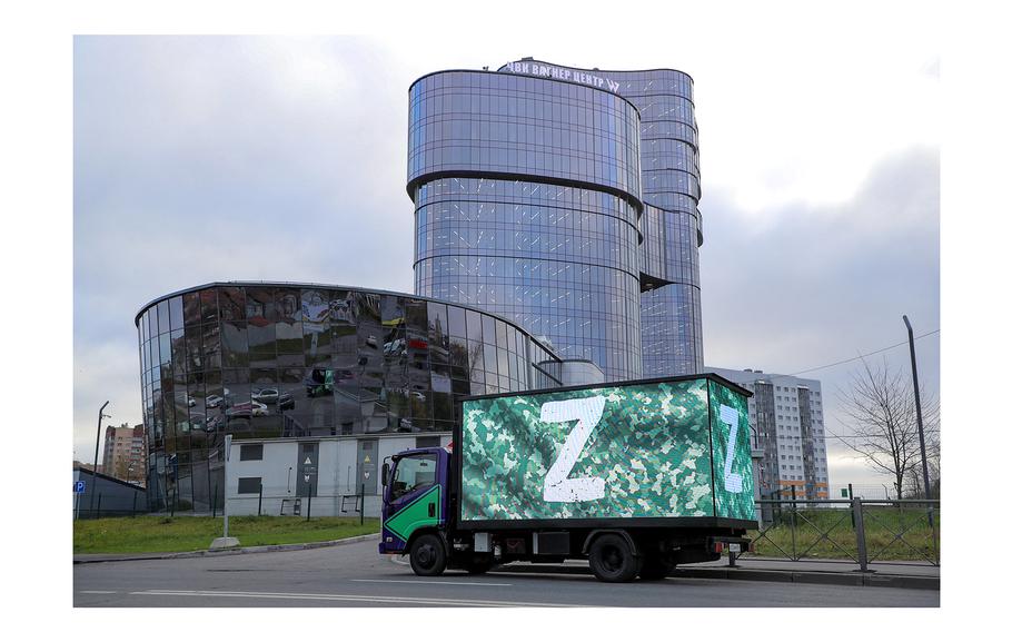 A truck displaying the symbols “Z” in support of the Russian armed forces involved in a military conflict in Ukraine is parked outside PMC Wagner Centre, a project implemented by the businessman and founder of the Wagner private military group Yevgeny Prigozhin, as seen Nov. 4, 2022, during the official opening of the office block in Saint Petersburg, Russia.