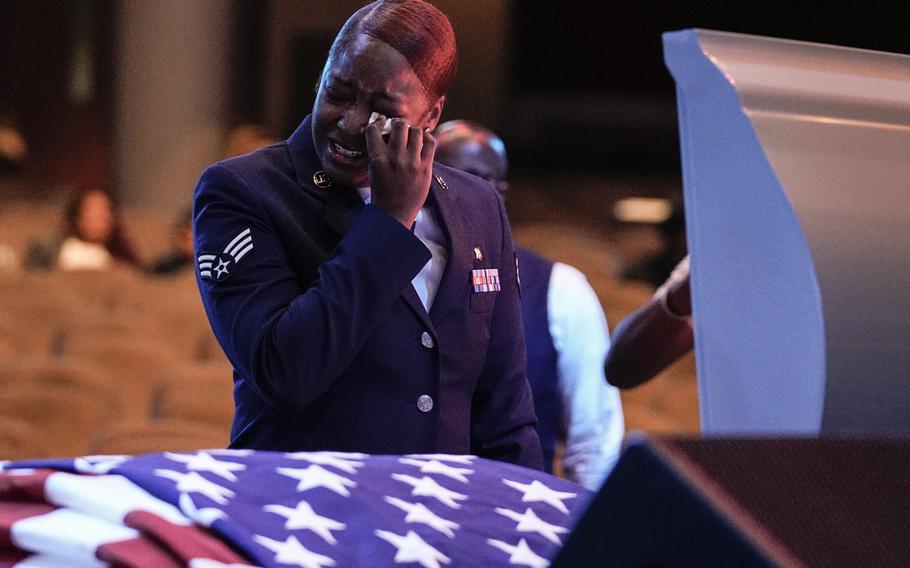U.S. Air Force personnel stand near the coffin of slain airman Roger Fortson during his funeral at New Birth Missionary Baptist Church, Friday, May 17, 2024, near Atlanta.