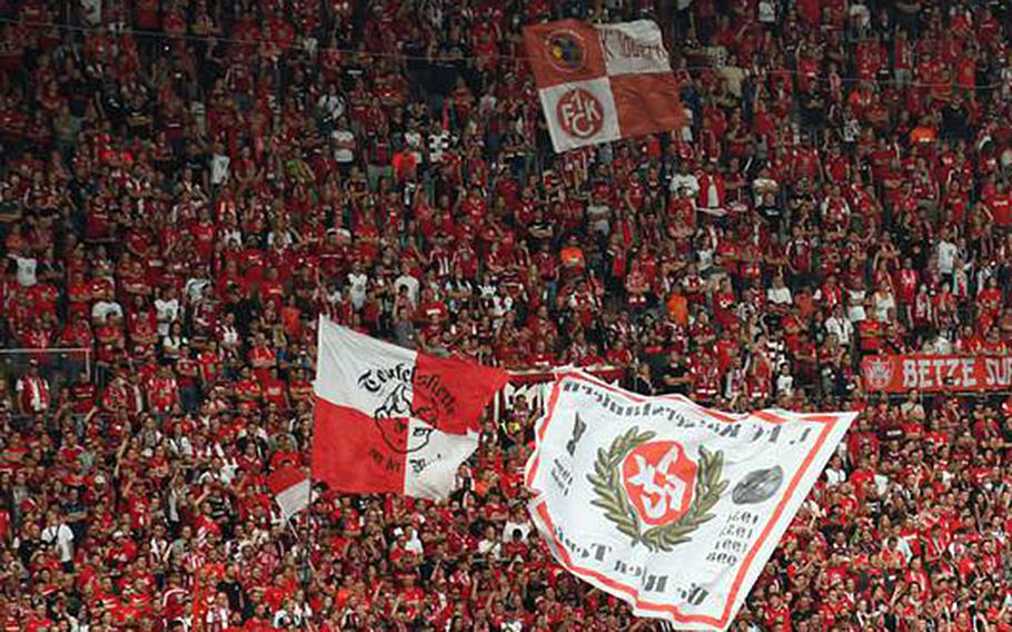 Kaiserslautern fans cheer on their soccer team during a game at Fritz Walter Stadium.