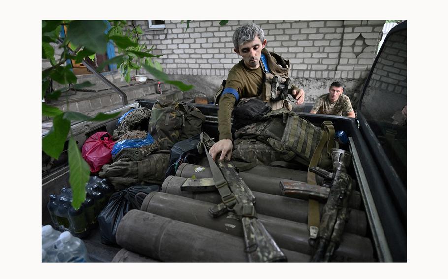 A mortar operator of the 47th Mechanised Brigade of Ukrainian army prepares to go on a mission in Pokrovsk area, Donetsk region, on June 12, 2024, amid the Russian invasion of Ukraine. 