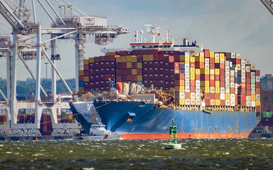 The container ship Dali is pulled into the main channel after leaving the Seagirt Marine Terminal on its way to Norfolk Monday morning 90 days after the ship hit a support pier of the Francis Scott Key Bridge causing a catastrophic collapse. (Jerry Jackson/Baltimore Sun/TNS)