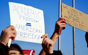 Students demonstrate over disbanded clubs, the removal or review of course materials and policies geared toward eliminating diversity, equity and inclusion initiatives during a walkout at Humphreys High School on Camp Humphreys, South Korea, March 6, 2025. 