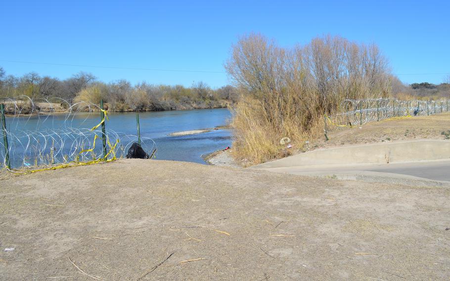 The Texas National Guard has placed coiled barbed wire along the U.S. border with Mexico in Eagle Pass, Texas, as seen on Feb. 14, 2022. Despite the physical deterrents, people illegally cross the Rio Grande in this area almost daily, according to troops working the state’s border security mission. 