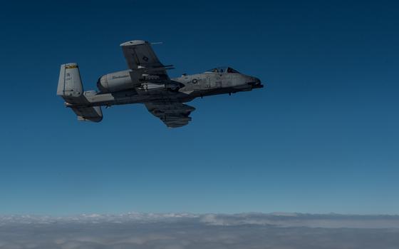 U.S. Air Force A-10 Warthog flies off the wing of a USAF KC-135 Stratotanker before refueling, the A1-10s provide combat air support for Operation Inherent Resolve, Jan. 30, 2015, in Iraq. Coalition aircraft have been conducting air strikes against the Da'esh since August 2014. (U.S. Air Force Photo by Staff Sgt. Perry Aston/Released)