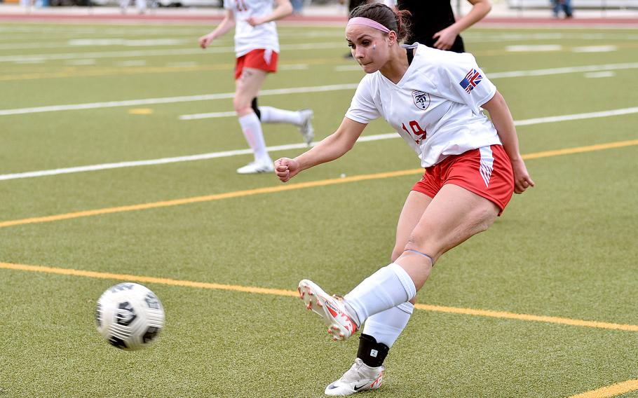 Peyton Caranta tries to clear the ball.