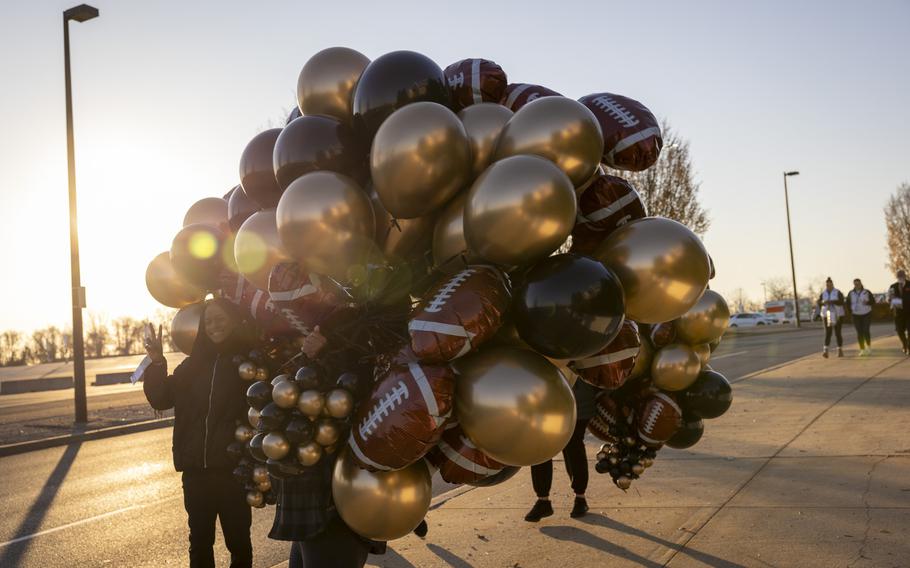 Gold and black balloons. 