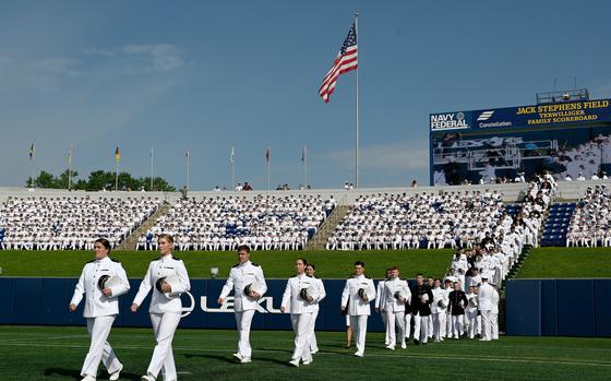 The procession of graduating midshipmen. The Naval Academy held its Class of 2024 commissioning and graduation ceremony Friday at Navy-Marine Corps Memorial Stadium in Annapolis. (Paul W. Gillespie/Staff photo)