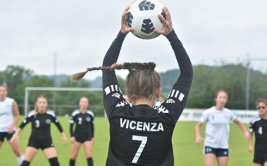 Her ponytails might indicate she's going left, but Vicenza's Hannah Pratt actually did inbound the ball straight in front of her in a semifinal match Wednesday, May 22, 2024, at the DODEA European Division II girls soccer championships at Reichenbach-Steegen, Germany.
