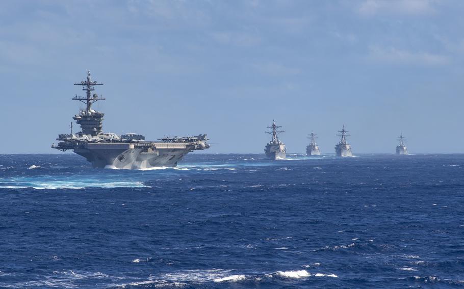 The Theodore Roosevelt carrier strike group transits the Pacific Ocean in 2020. 