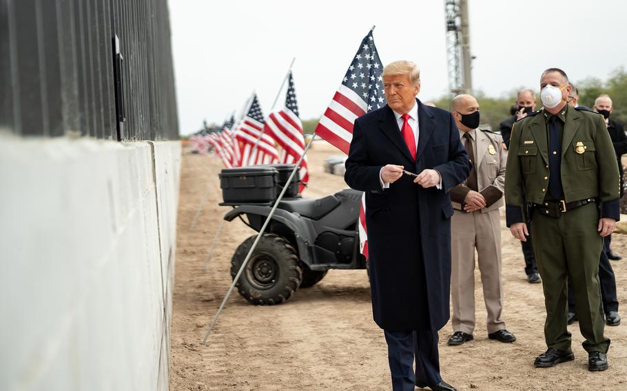 Former President Donald Trump tours a section of the U.S.-Mexico border wall Jan. 12, 2021, near Alamo, Texas. Reinforcing his focus on border security is a key element of his policy agenda. Similar goals are outlined in the Heritage Foundation's Project 2025 document. 