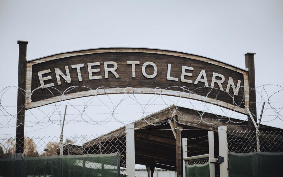 A sign reading “Enter to learn” at the entrance of the 7th Army Noncommissioned Officer Academy at Camp Normandy in Grafenwoehr, Germany.