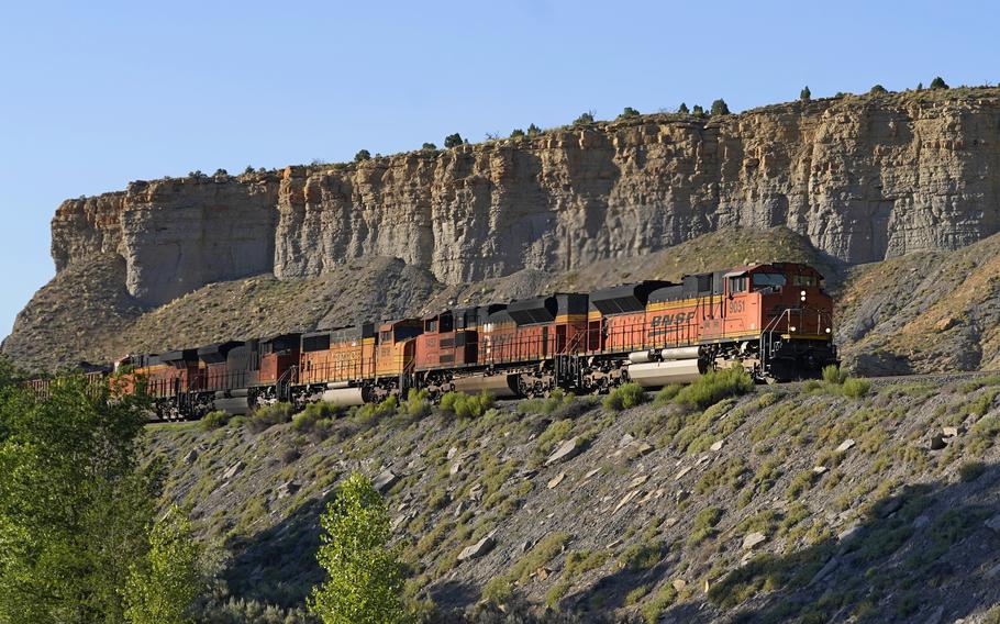 A train transports freight on a common carrier line near Price, Utah, in July 2023.