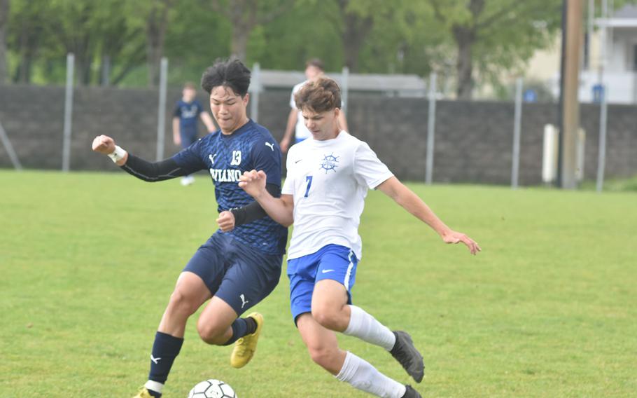 Aviano’s Joseph Guerrero and Rota’s Zepplin Hasselbring battle for the ball Saturday, April 27, 2024, in the Saints 3-2 victory. Guerrero scored twice and Hasselbring once on the day.