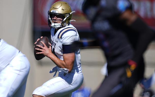 Navy quarterback Blake Horvath drops back to pass the ball in the second half of an NCAA college football game against Air Force Saturday, Oct. 5, 2024, at Air Force Academy, Colo.(AP Photo/David Zalubowski)