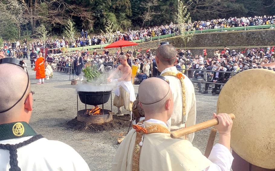 A crowd gathers for a fire-walking festival.