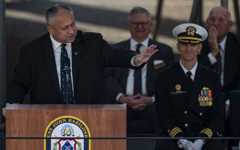 Carlos Del Toro, the secretary of the Navy, speaks at the commissioning ceremony of the USS John Basilone.