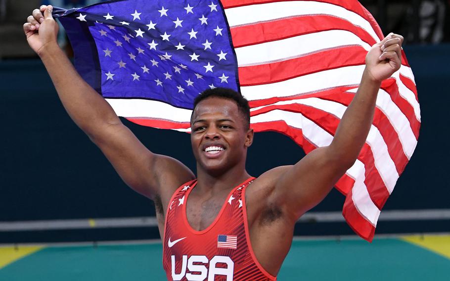 Specialist Kamal Bey of the U.S. Army World Class Athlete Program celebrates after winning a gold medal in the Greco-Roman wrestling 77 kg weight class at the 2023 Pan American Games in Santiago, Chile. Bey plans to compete in the 2024 Paris Olympic Games.