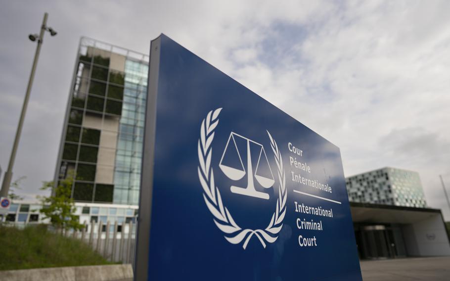 The front of the ICC in The Hague is seen with a sign depicting the court’s name and logo.