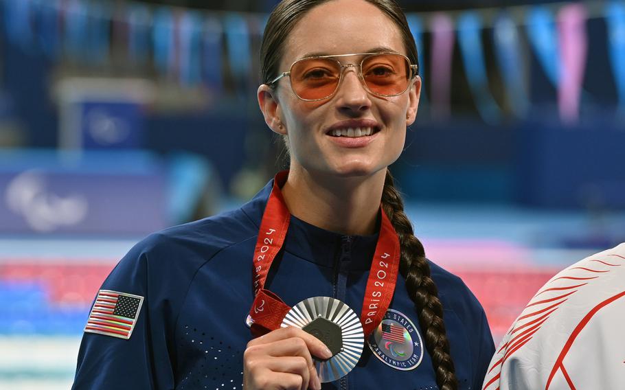 Elizabeth Marks, a U.S. Army sergeant first class, shows off her fifth silver medal of the 2024 Paris Paralympic Games, after finishing second in the women’s 100-meter backstroke event, Sept. 7, 2024. 