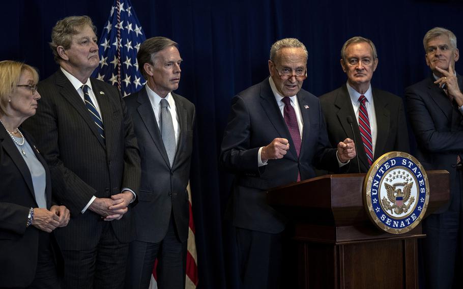 Senate Majority Leader Sen. Chuck Schumer (D-New York) speaks at a news conference with, from left, Sen. Maggie Hassan (D-New Hampshire), Sen. John Kennedy (R-Louisiana), U.S. Ambassador to China Nicholas Burns, Sen. Mike Crapo (R-Idaho), and Sen. Bill Cassidy (R-Louisiana) on Wednesday, Oct. 9, 2023 in Beijing. Schumer is leading a bipartisan U.S. Senate delegation visit to China, the first in four years, that includes a meeting with China's President Xi Jinping. 