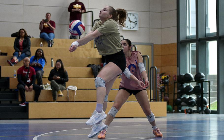 SHAPE junior Johana Borocova of the Gold team bumps the ball with teammate Emma Inthavixay of Ramstein in the background during the 2024 DODEA-Europe All-Star volleyball matches on Nov. 9, 2024, at Ramstein High School on Ramstein Air Base, Germany.