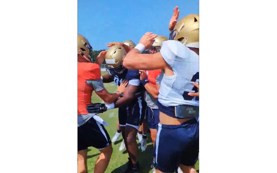 On Saturday, Navy stopped its football practice so defensive end Chreign LaFond could get a bit of very big news: His sister, Thea, had just won an Olympic gold medal in the women’s triple jump in Paris.