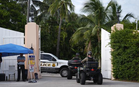 Police drive in to the Mar-a-Lago estate of Republican presidential nominee and former President Donald Trump, one day after an apparent assassination attempt, in Palm Beach, Fla., Monday, Sept. 16, 2024. (AP Photo/Rebecca Blackwell)