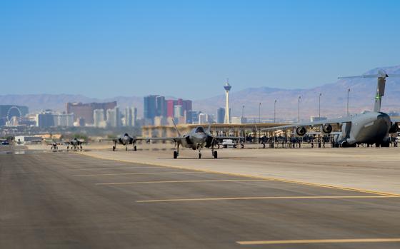 Three Royal Australian Air Force (RAAF) F-35As and an  F-16 Falcon assigned to the 16th Weapons Squadron, U.S. Air Force Weapons School, taxis out for a routine training mission at Nellis Air Force Base, Nevada, May 17, 2022. Joint exercises are a routine occurrence at Nellis AFB which continues to strength relationships between the United States and allied nations. (U.S. Air National Guard photo by Staff Sgt. Adam Welch)