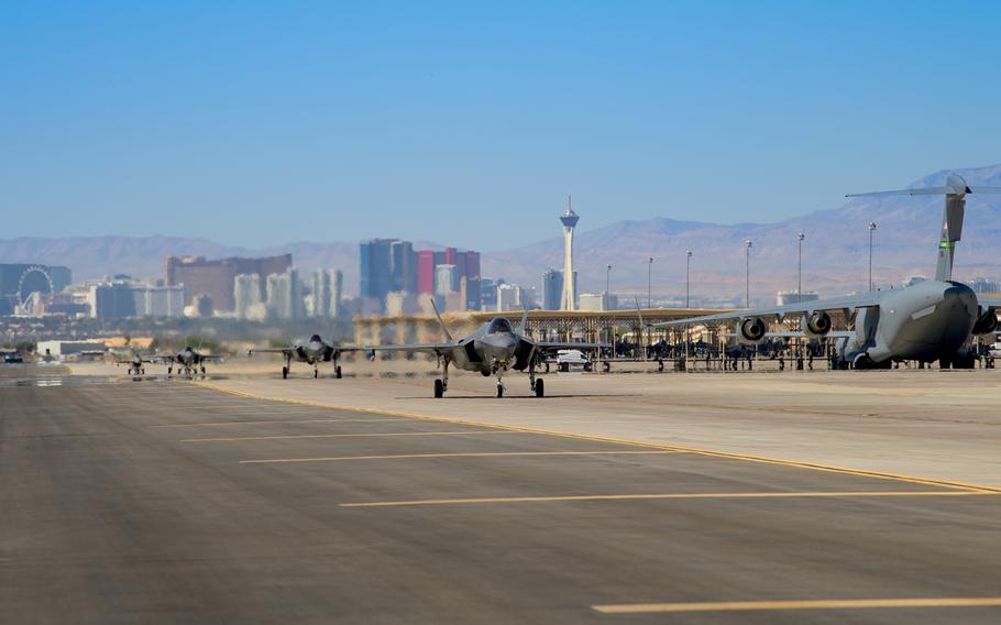 Australian and U.S. fighter jets taxi for training mission at Nellis Air Force Base, Nevada, May 17, 2022. 