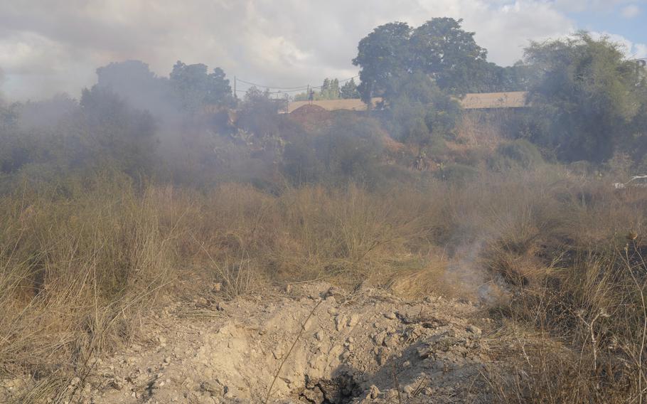 A crater is seen after the military fired interceptors at what the Israeli army says is a missile launched from Yemen that landed in central Israel on Sunday, Sept. 15, 2024. 