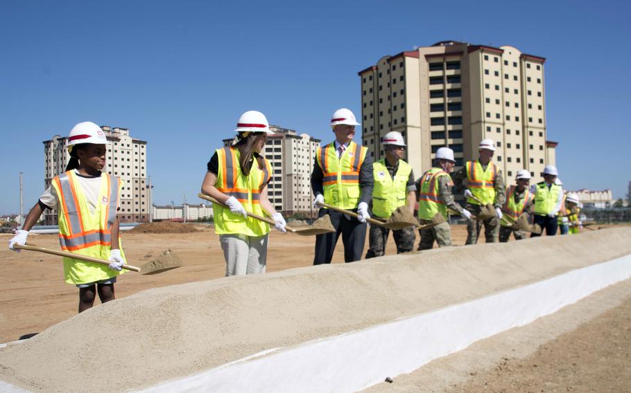 Students, construction workers and Department of Defense Education Activity officials break ground on a new elementary school at Camp Humphreys, South Korea, Thursday, Sept. 7, 2023. 