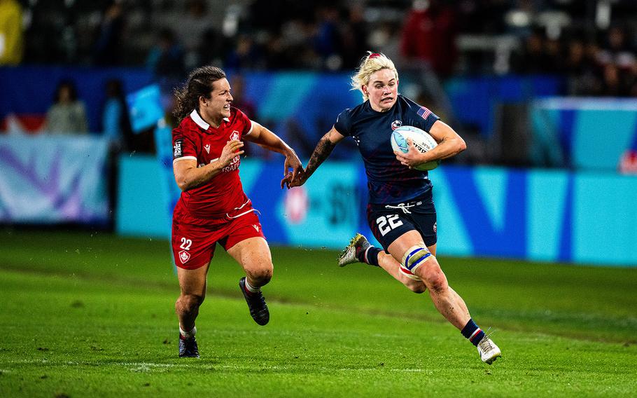 U.S. Army Capt. Sammy Sullivan runs past a Canadian player during a pool-play rugby sevens match at the Los Angeles SVNS tournament on March 3, 2024, at Dignity Health Sports Park in Carson, Calif. Sullivan will be competing for the U.S. women’s rugby sevens team during the 2024 Paris Olympics on July 28-30 at Stade de France in Saint-Denis, France.