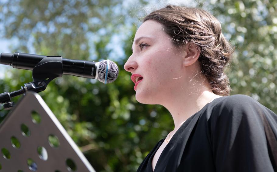 Camille Noel, a George Washington University history graduate, speaks during a ceremony in Épagne-Épagnette, France, Saturday, June 22, 2024. Noel’s research of an American B-17 bomber crew whose plane was shot down during World War II lead to the crew being honored with a memorial near the crash site. 