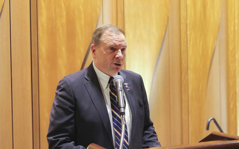 Retired Gen. Ben Hodges speaks to soldiers on a stage in Nashville. 