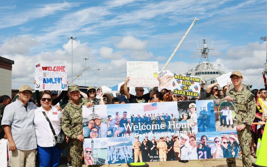 Friends and family of USS Daniel Inouye welcome the ship and crew home