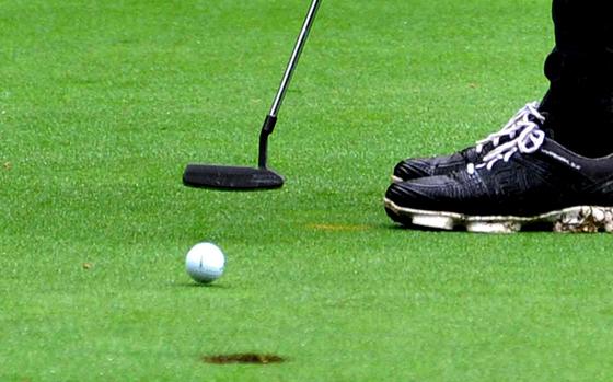 RamsteinÕs Micah Webb makes a putt in opening day  action at the DODEA-Europe high school golf championships in Wiesbaden, Germany, Oct. 9, 2019. He is third going in to ThursdayÕs final, three points behind the leader after posting a modified Stableford 36 points.

MICHAEL ABRAMS/STARS AND STRIPES








