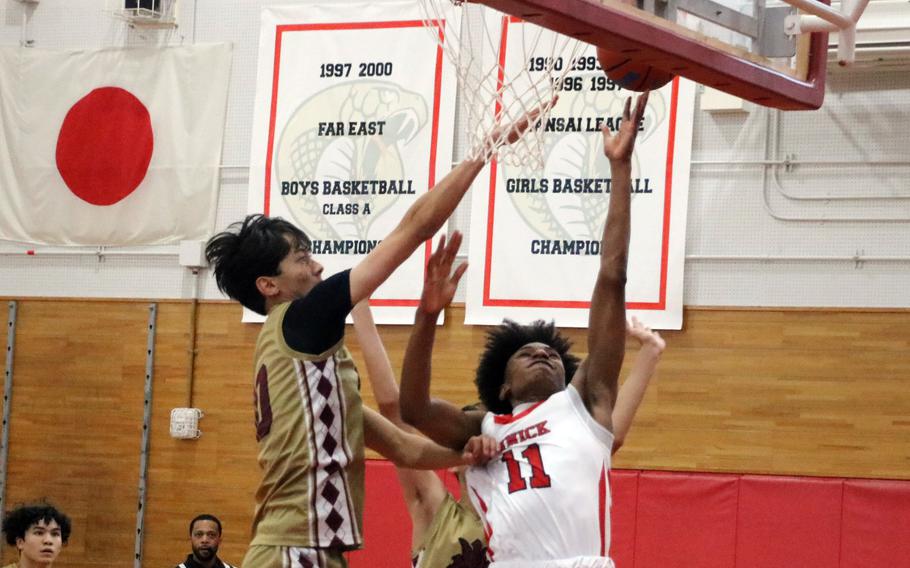 Isaiah Kimbrough shoots the ball.