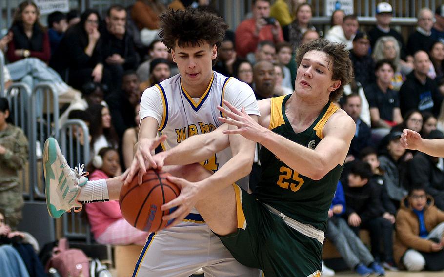 Jake Koschnik and Keller Schutt battle for a rebound.