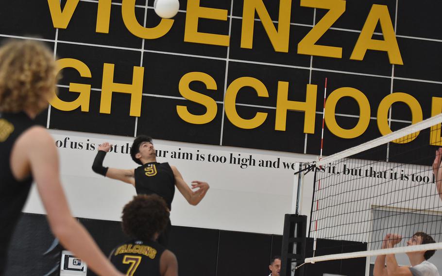 Rohail Jan jumps for a spike.