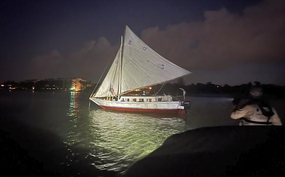 In this photo provided by the Monroe County Sheriff's Office, a sailboat carrying a group of over 100 migrants from Haiti is shown after they arrived off Key West, Fla., early Wednesday, June, 26, 2024. (Monroe County Sheriff's Office via AP)
