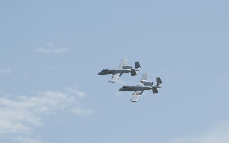 Two U.S. Air Force A-10C Thunderbolt II aircraft conduct an aerial demonstration during the 2024 Wings Over Whiteman Air Show at Whiteman Air Force Base, Mo., July 13, 2024. A