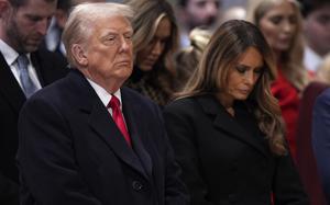 President Donald Trump, left, and first lady Melania Trump attend the national prayer service at the Washington National Cathedral, Tuesday, Jan. 21, 2025, in Washington. (AP Photo/Evan Vucci)