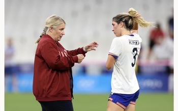 United States head coach Emma Hayes, left, talks to Korbin Albert (3) after winning a women’s group match against Australia during the Paris 2024 Olympic Games at Stade de Marseille on July 31, 2024, in Marseille, France. 