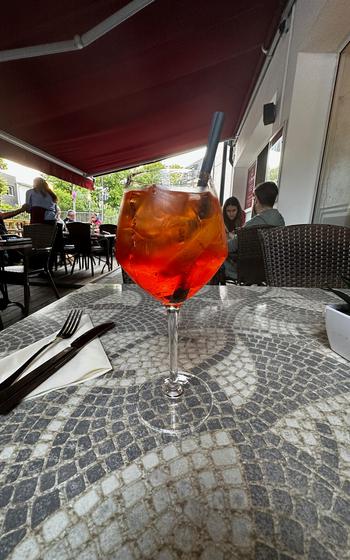 A classic Italian aperitif, the Aperol spritz, was designed to be a light drink to sip in the sun before dinner.
